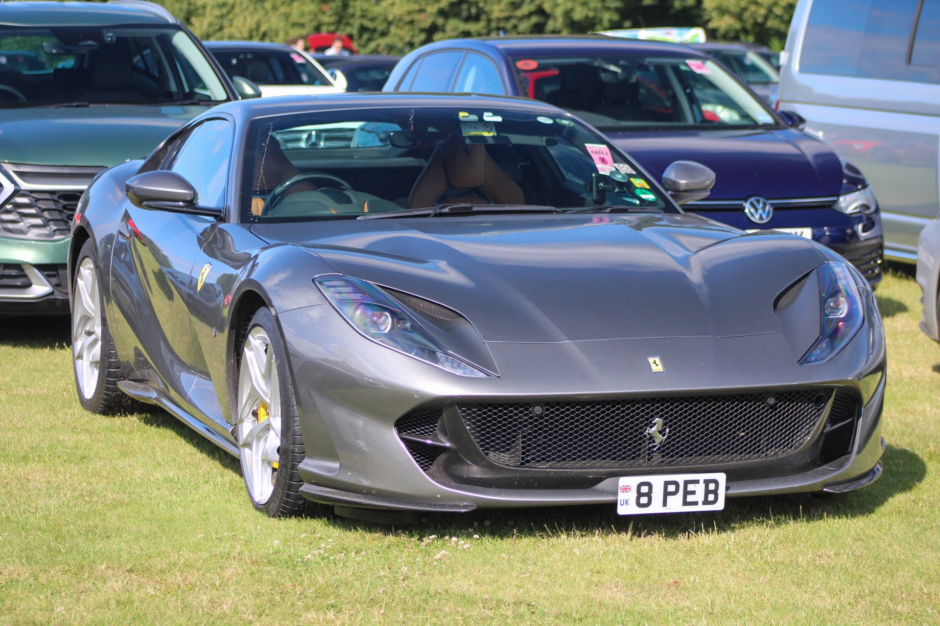 8 PEB private number plate on a Ferrari 812, spotted in Goodwood House
