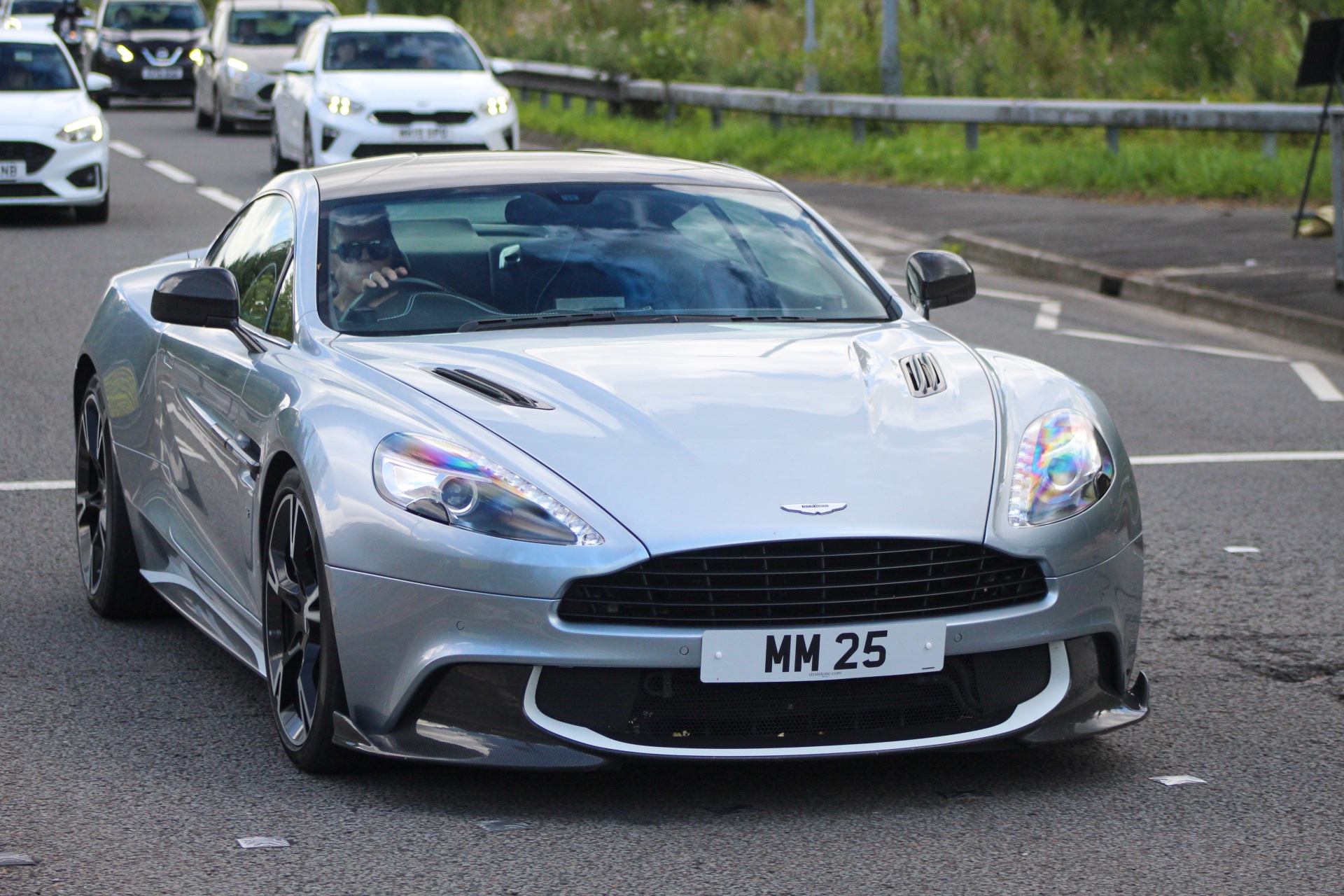 MM 25 private number plate on a Aston Martin Vanquish, spotted in Alderley Edge