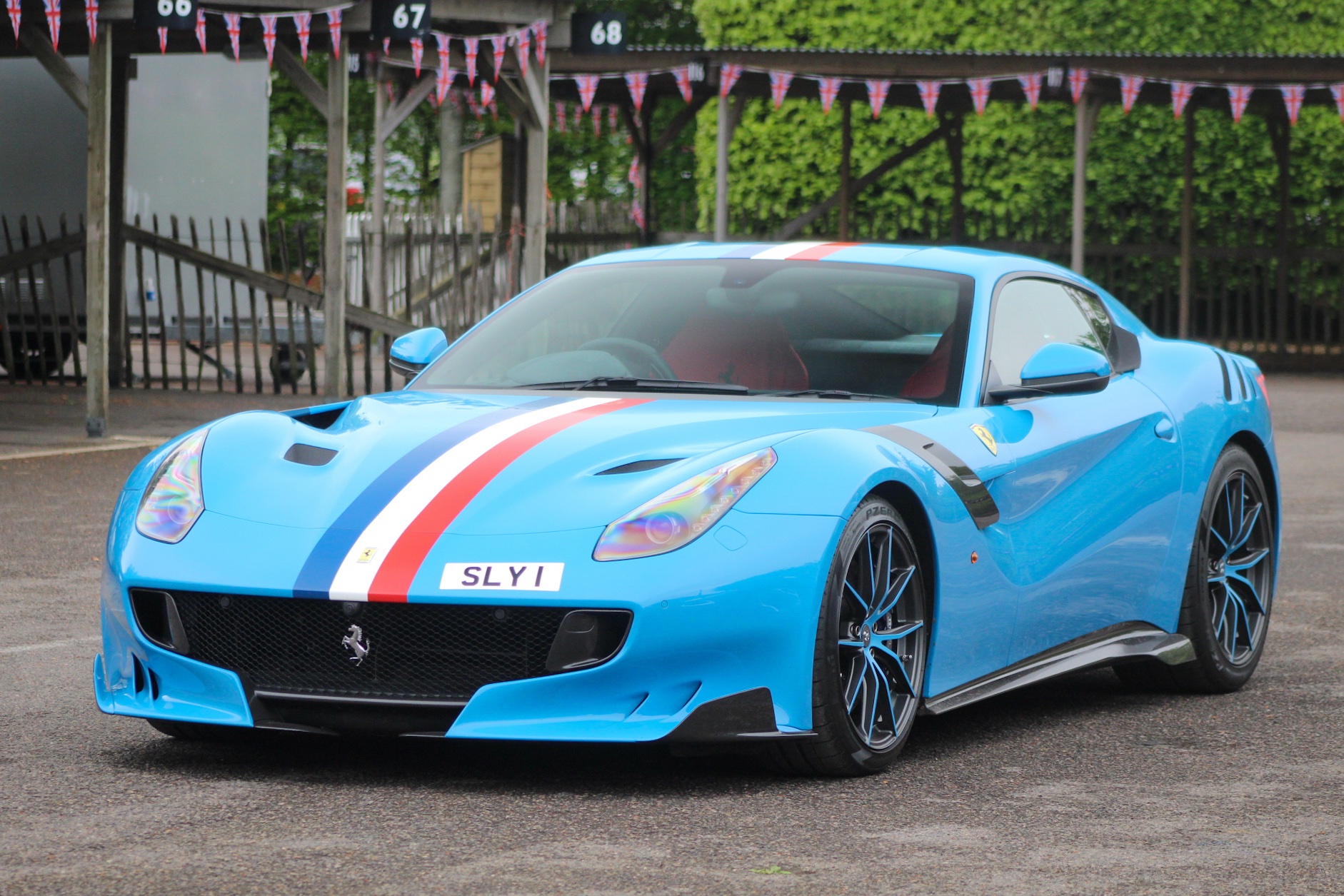 SLY 1 private number plate on a Ferrari F12, spotted in Goodwood Motor Circuit