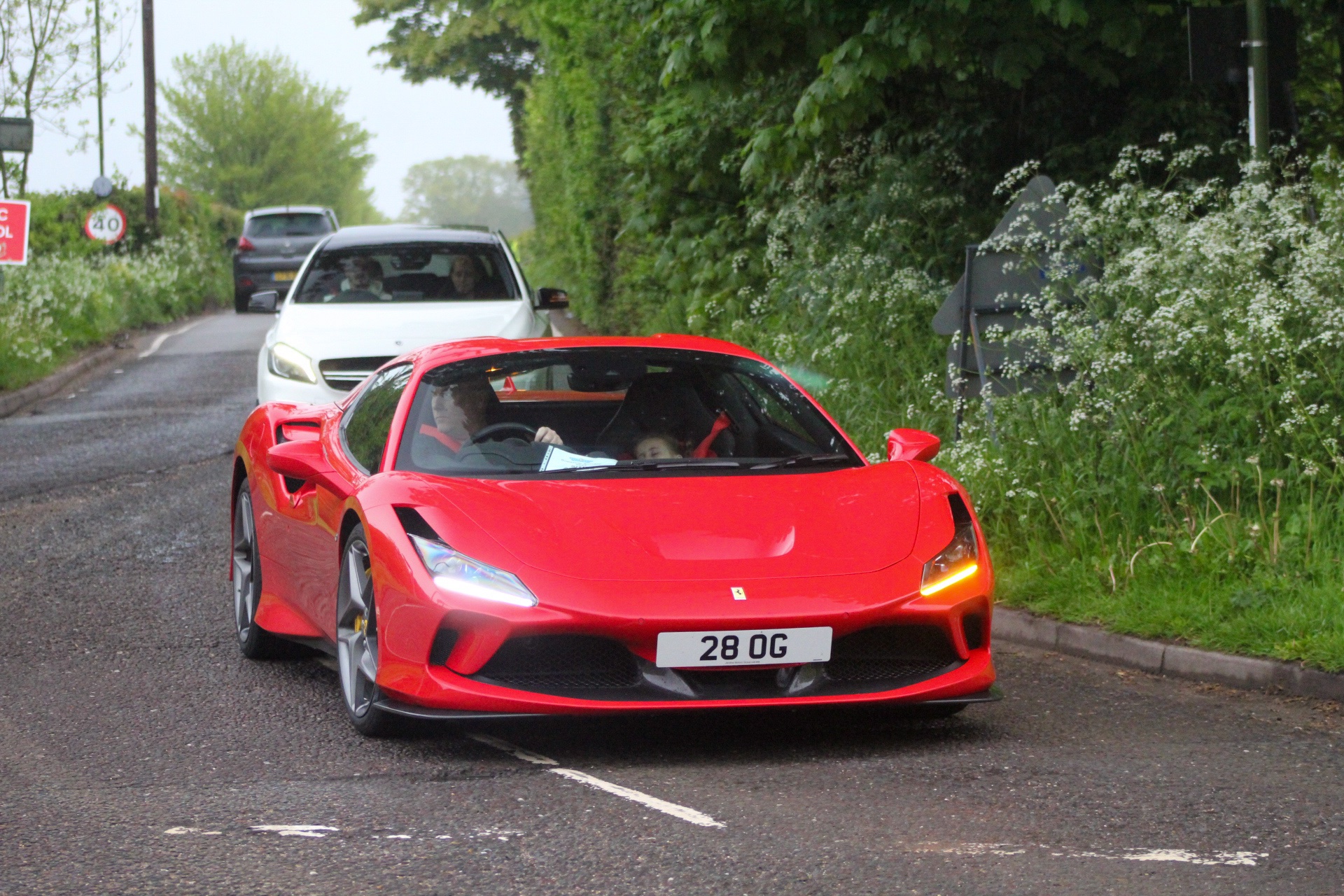 28 OG private number plate on a Ferrari F8, spotted in Goodwood Motor Circuit