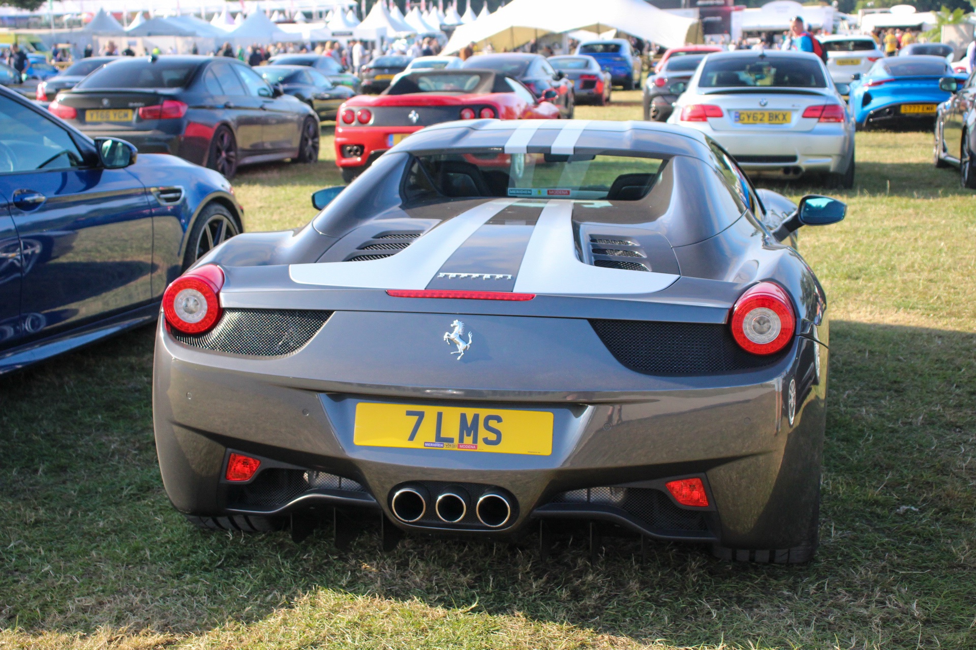 7 LMS private number plate on a Ferrari 458, spotted in Goodwood House