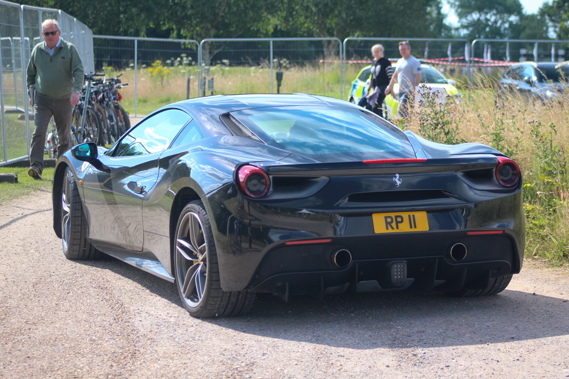 RP 11 private number plate on a Ferrari 488, spotted in Goodwood House