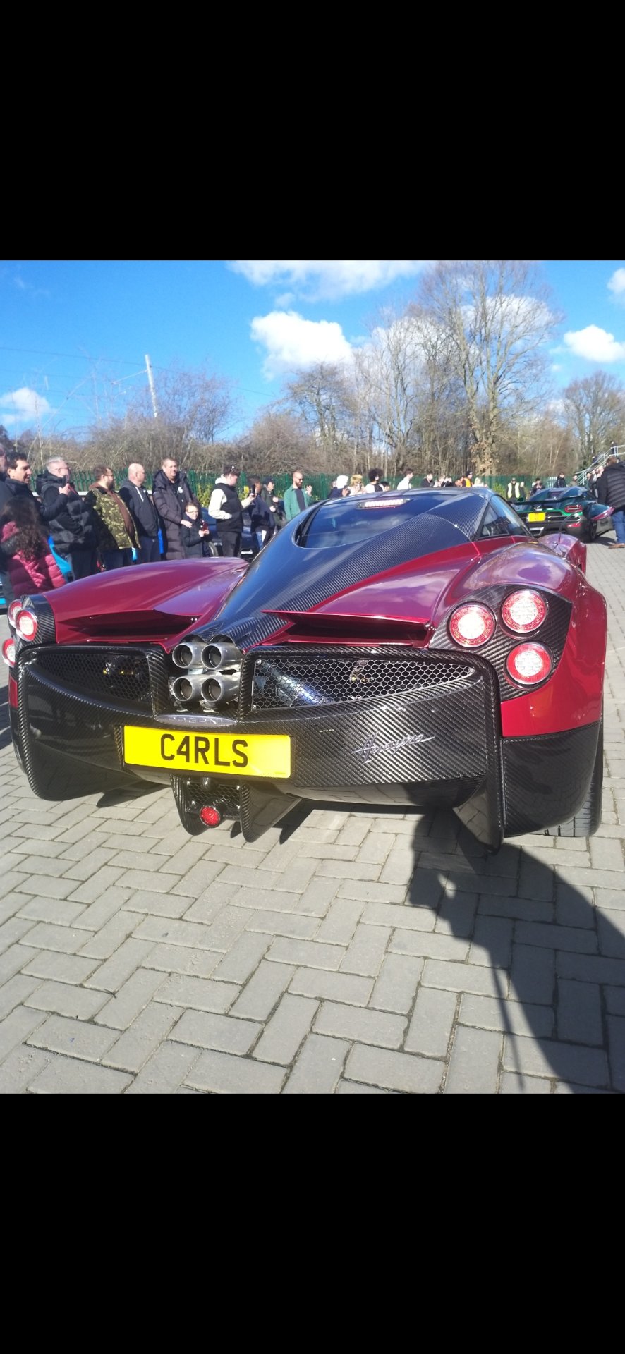 C4 RLS private number plate on a Pagani