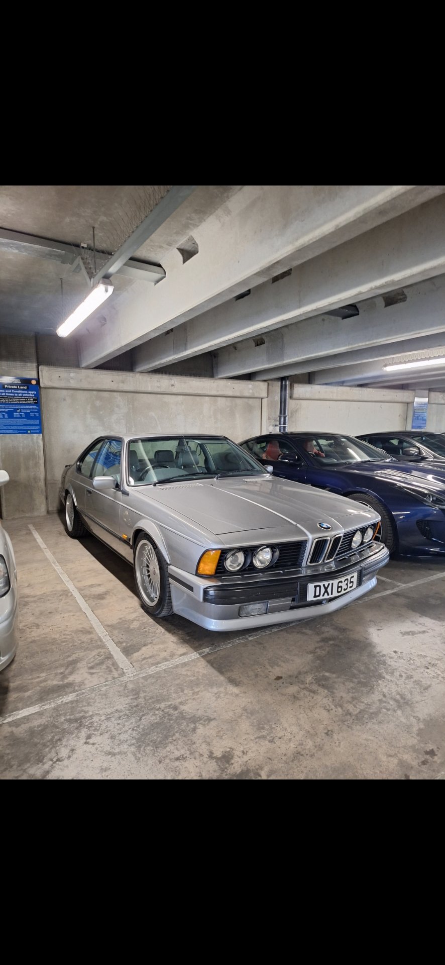 DXI 635 private number plate on a BMW 6 Series, spotted in London