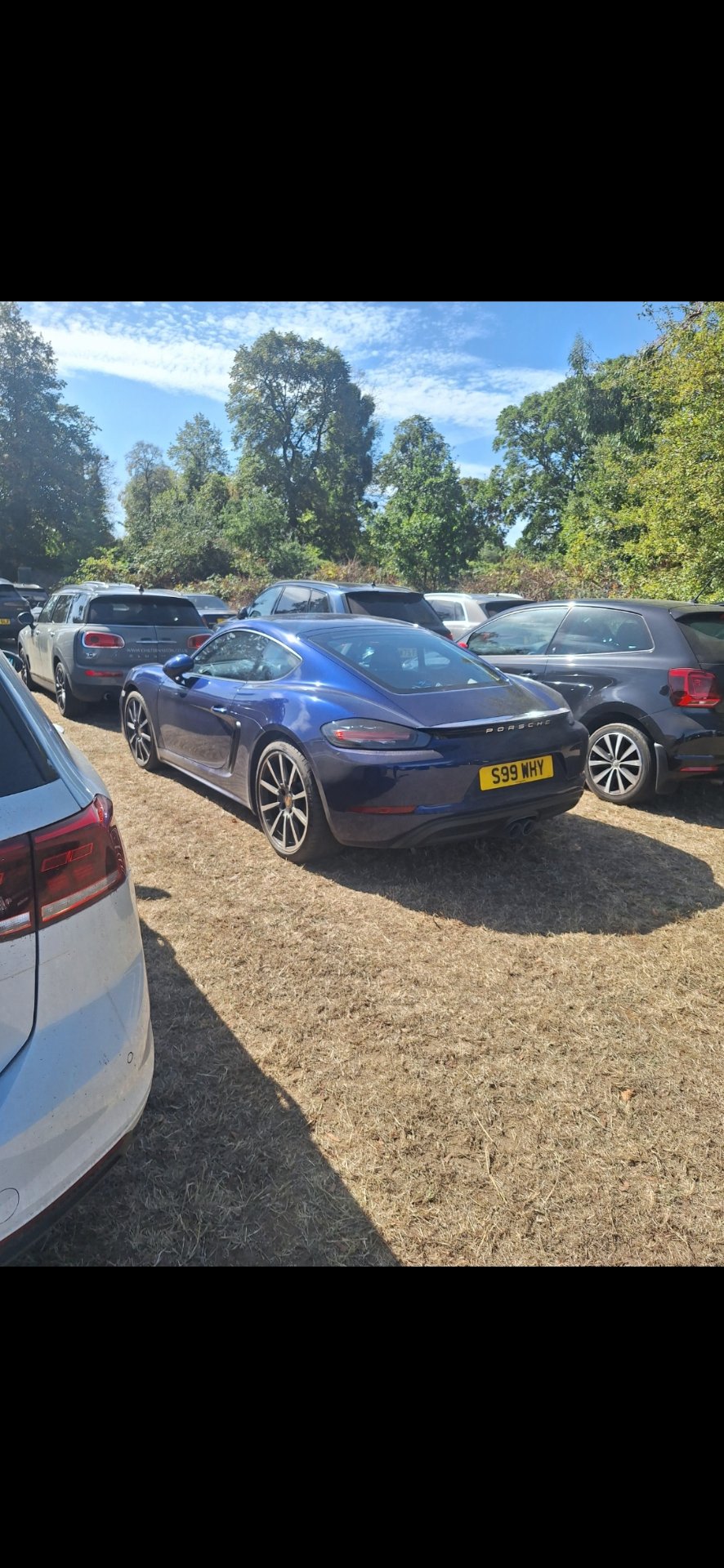 S99 WHY private number plate on a Porsche 718 Cayman, spotted in London