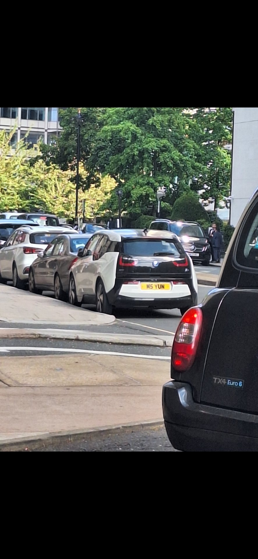 M5 YUN private number plate on a BMW i3, spotted in London