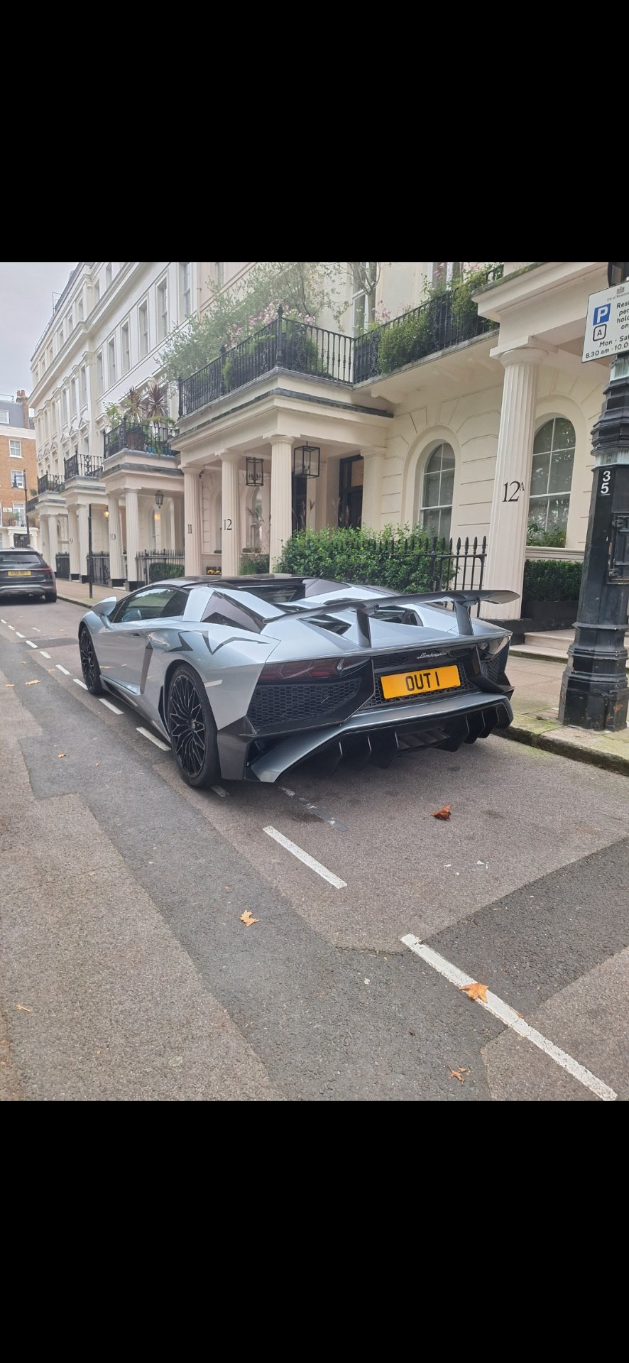 OUT 1 private number plate on a Lamborghini, spotted in London