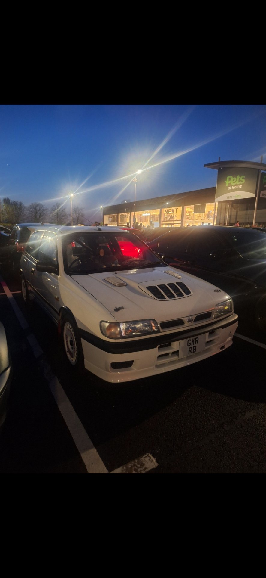 G11 RRB private number plate on a Nissan Pulsar, spotted in London
