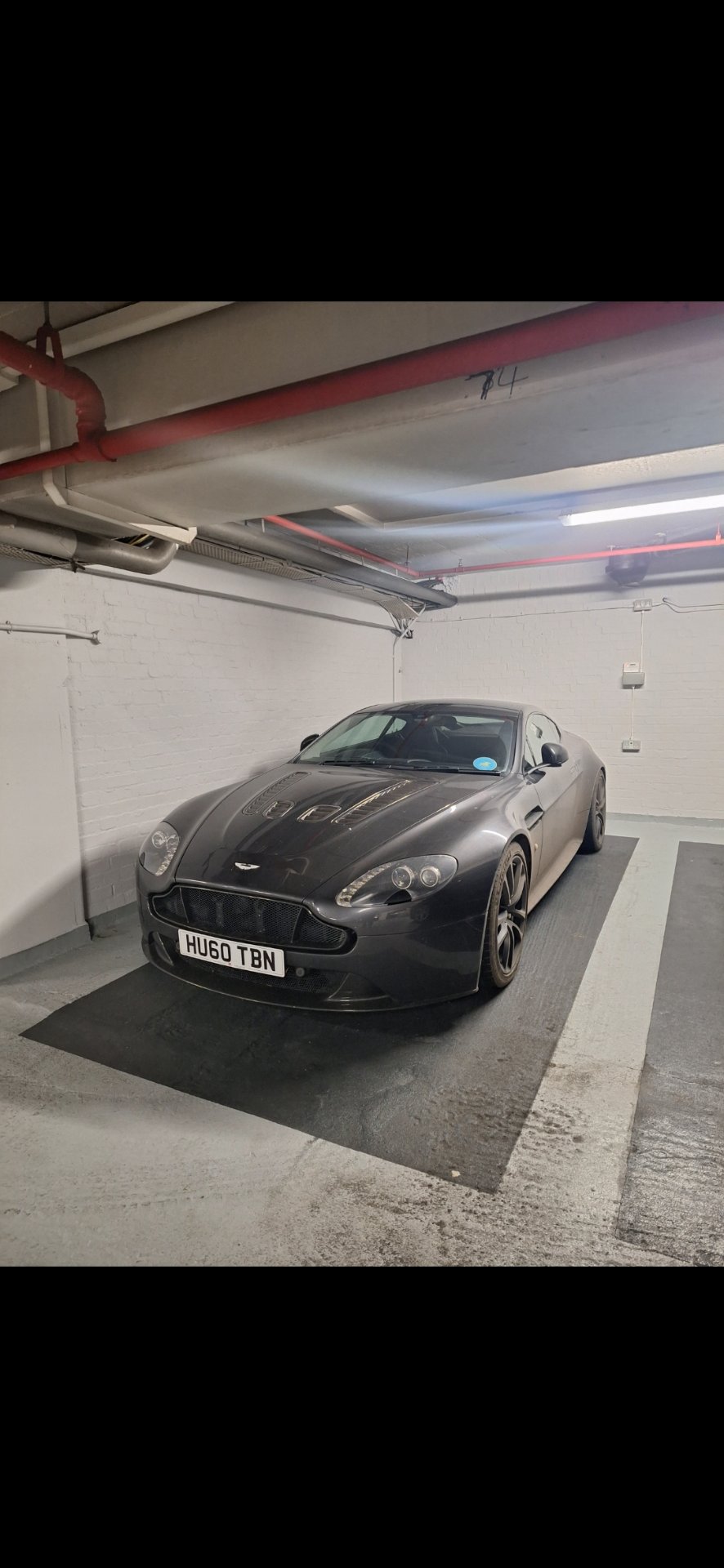 HU60 TBN private number plate on a Aston Martin V12 Vantage, spotted in London