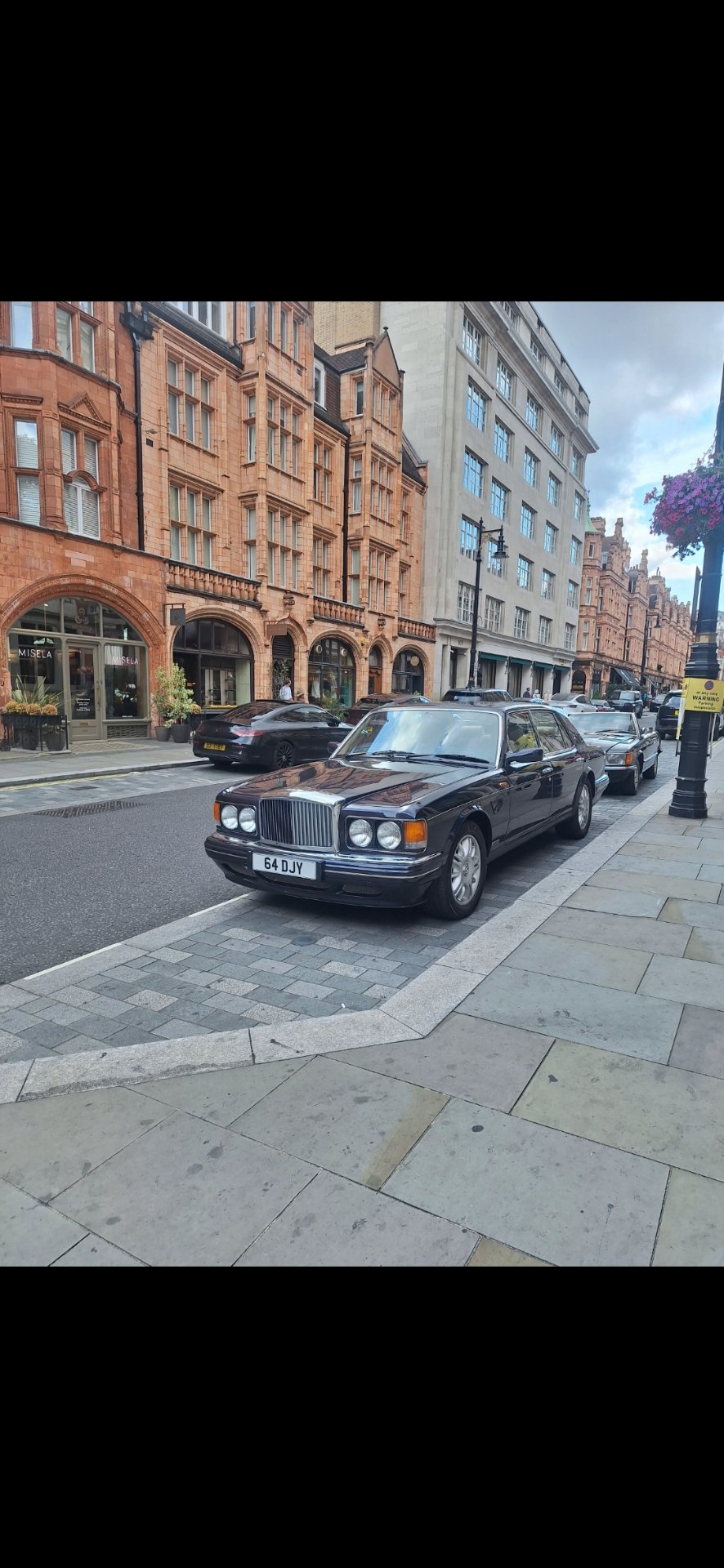 64 DJY private number plate on a Bentley, spotted in London