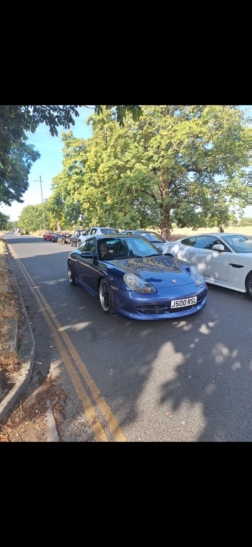 J500 RSL private number plate on a Porsche, spotted in London