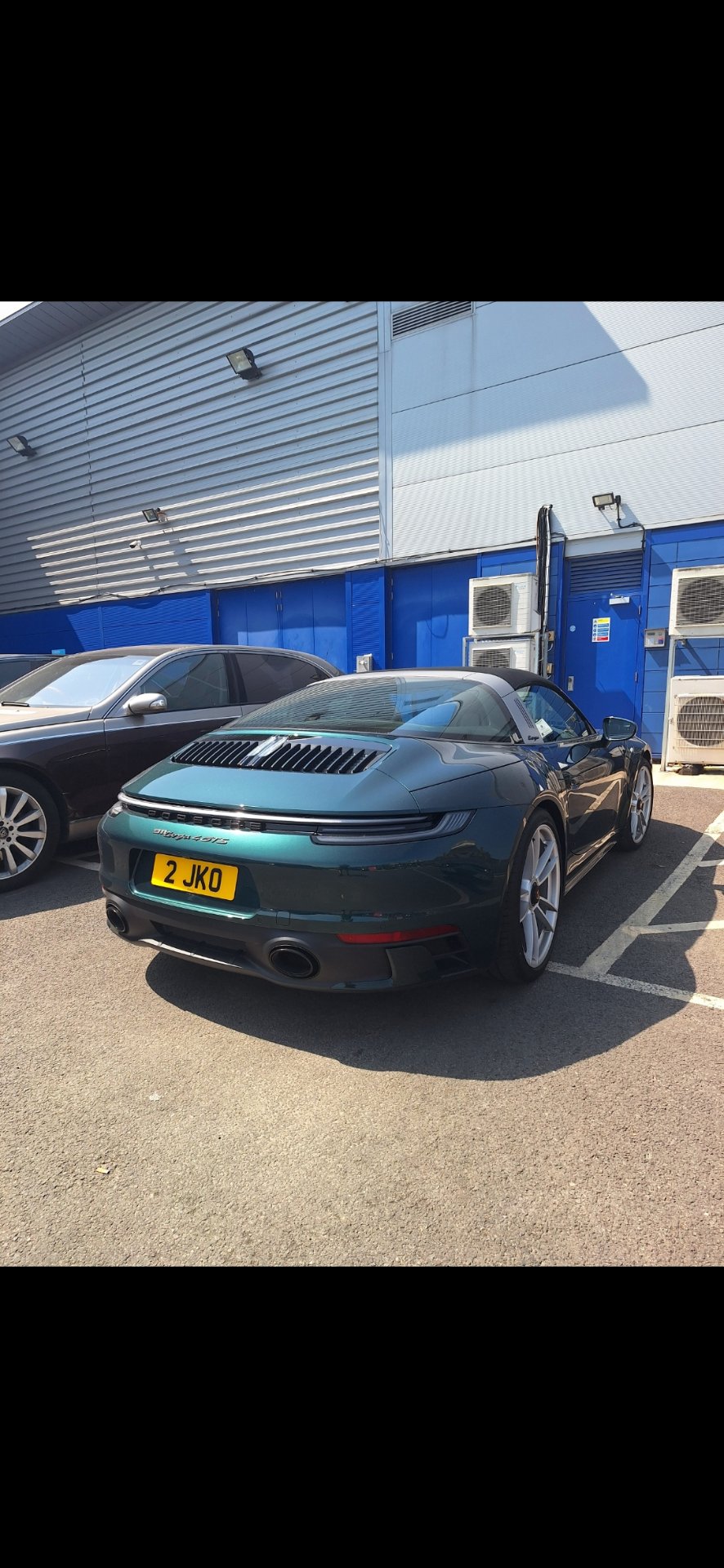 2 JKO private number plate on a Porsche, spotted in London