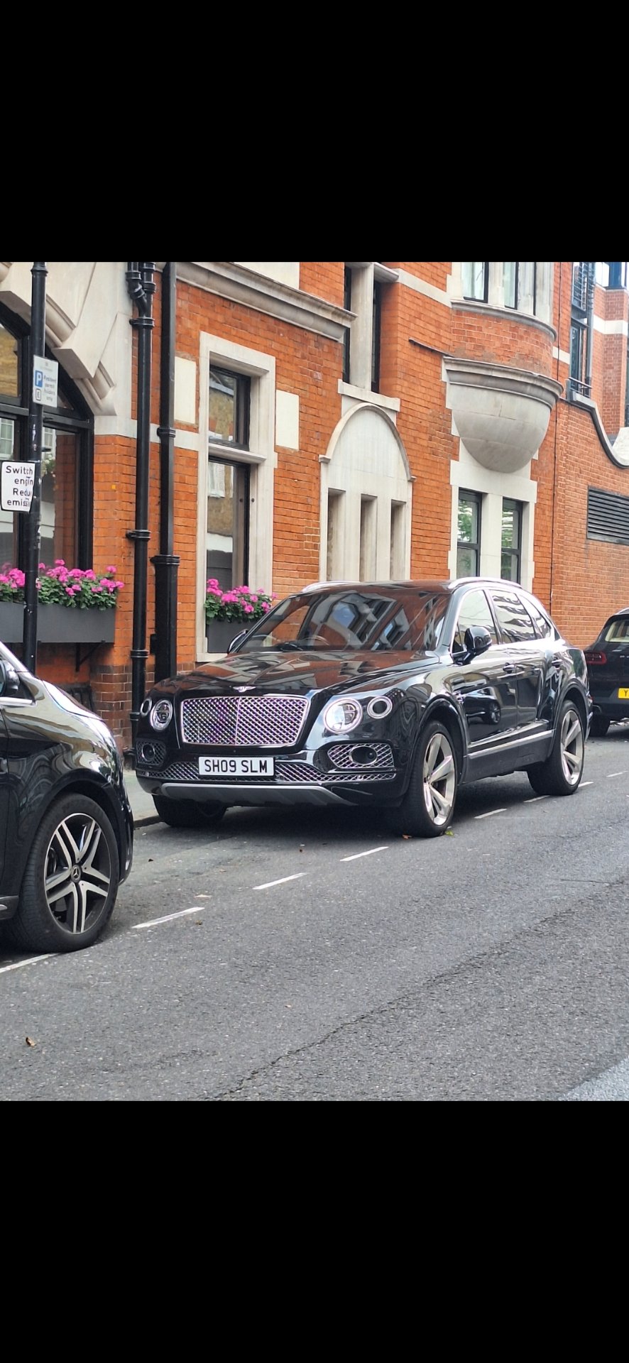 SH09 SLM private number plate on a Bentley Bentayga, spotted in London