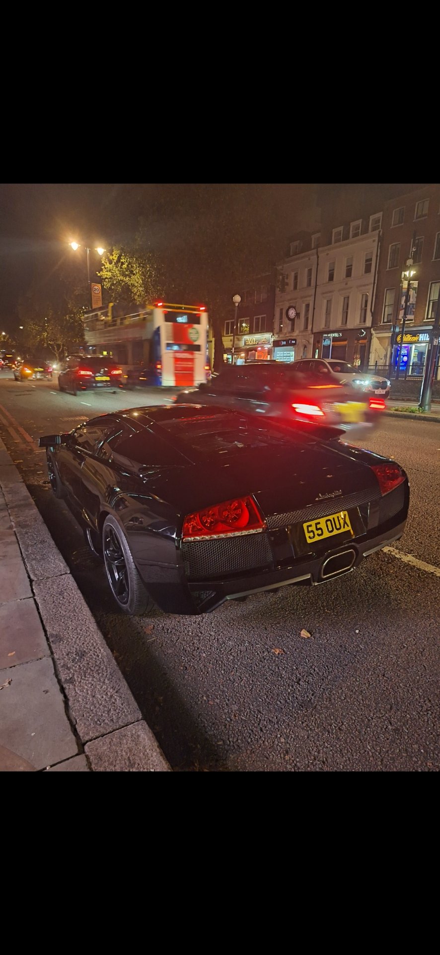 55 OUX private number plate on a Lamborghini, spotted in London