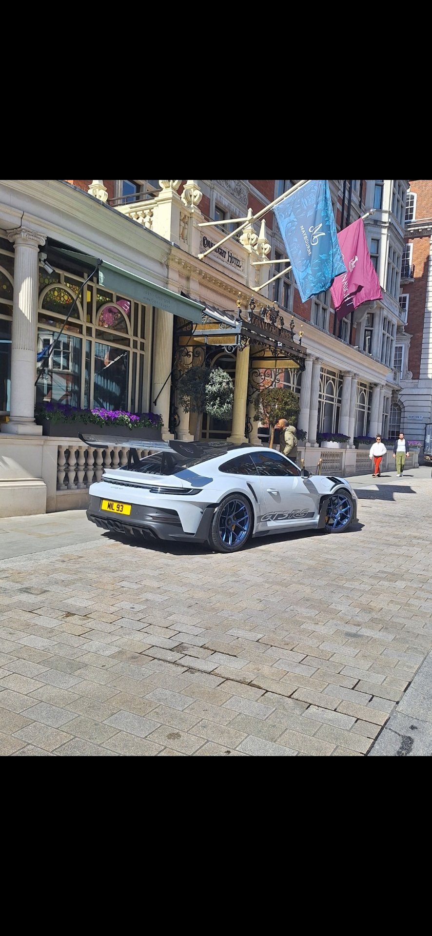 MIL 93 private number plate on a Porsche, spotted in London