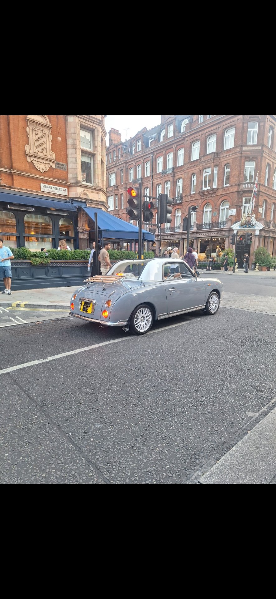 J999 UAE private number plate on a Nissan, spotted in London