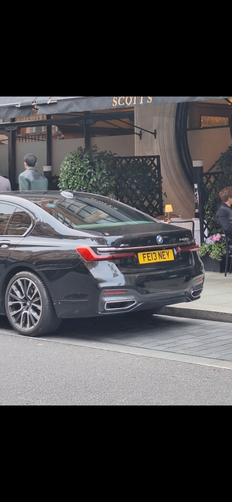 FE13 NEY private number plate on a BMW 7 Series, spotted in London