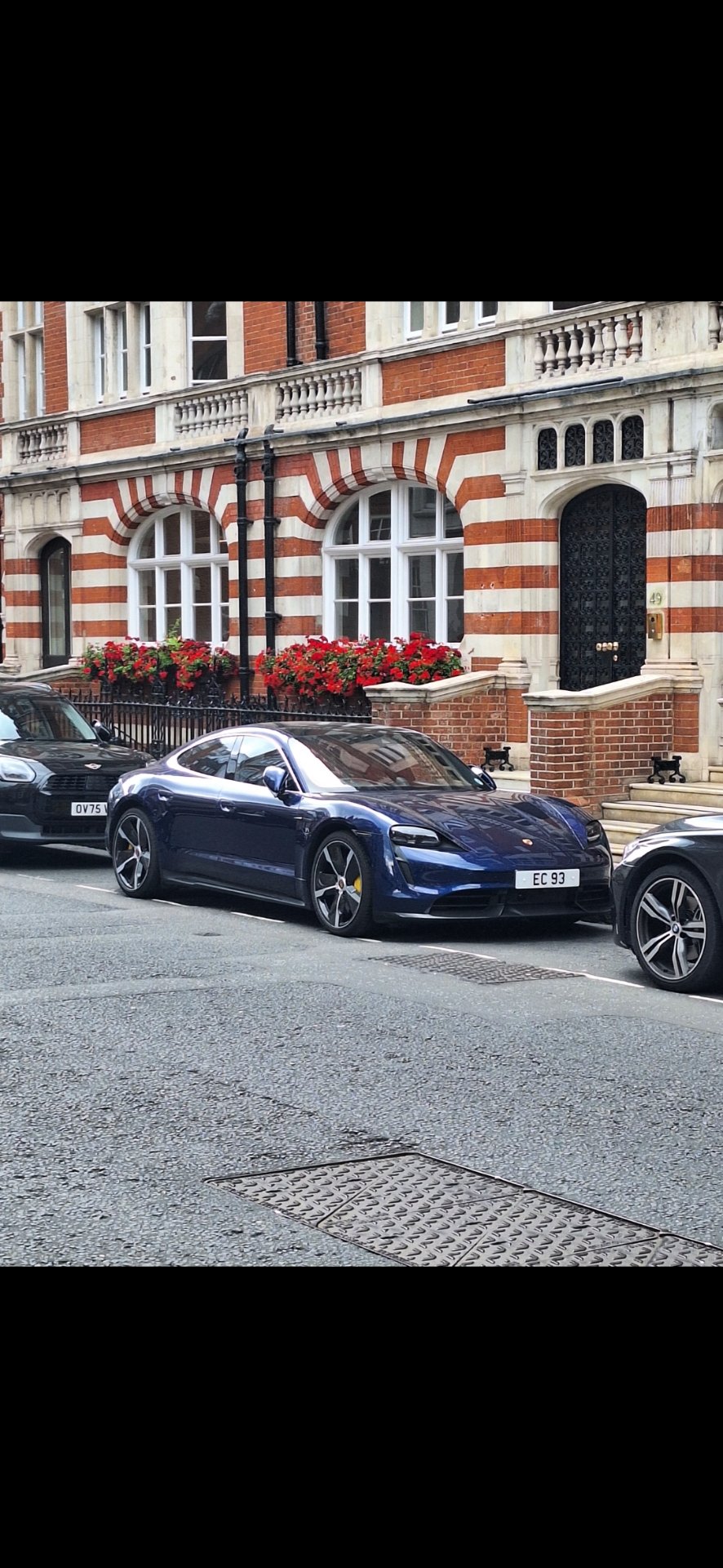 EC 93 private number plate on a Porsche Taycan, spotted in London