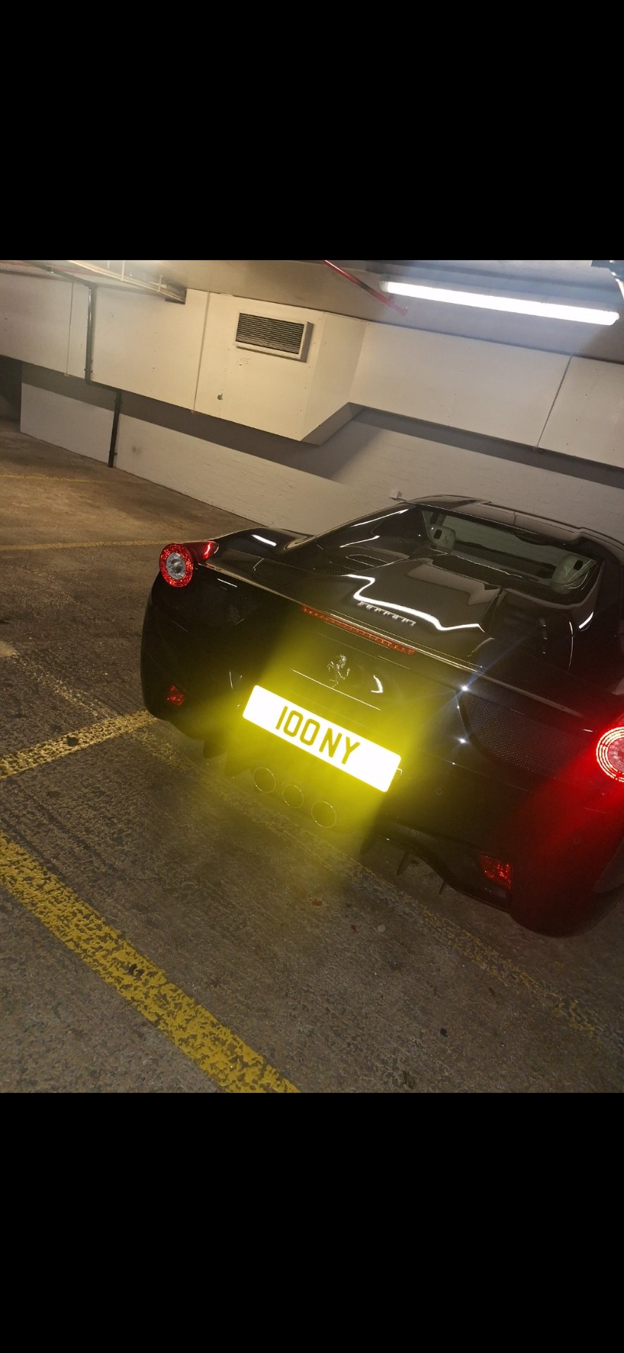 100 NY spotted on Ferrari 458