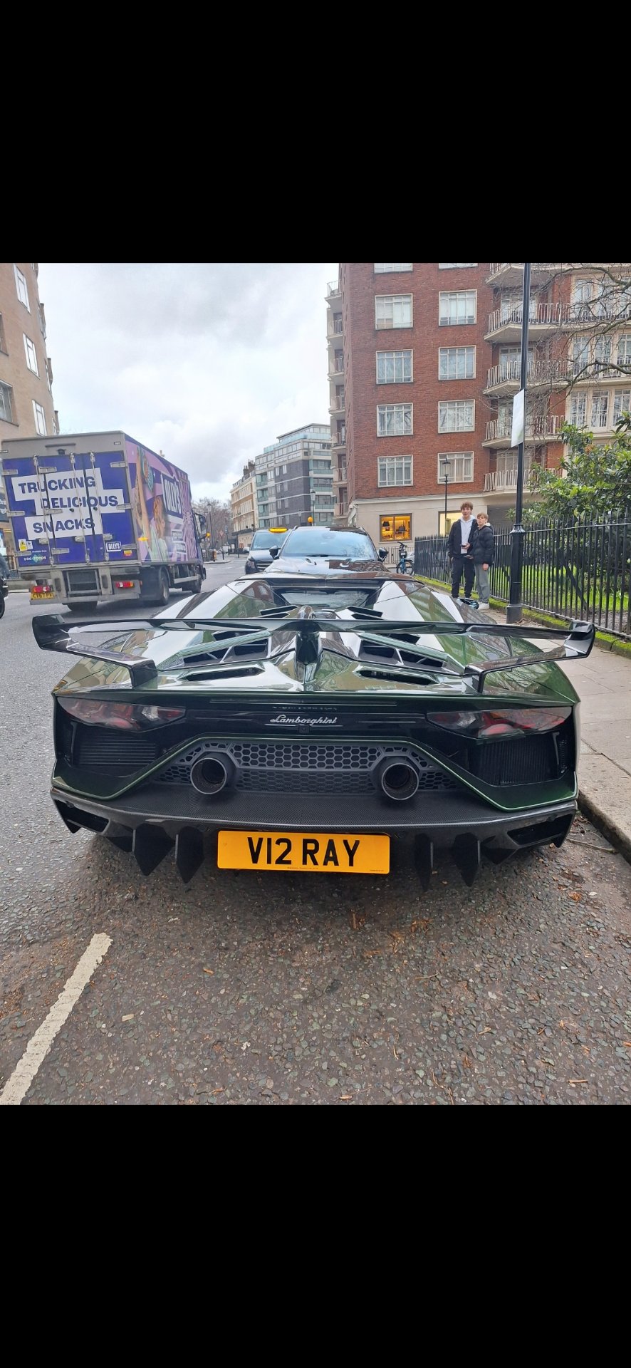 V12 RAY private number plate on a Lamborghini, spotted in London