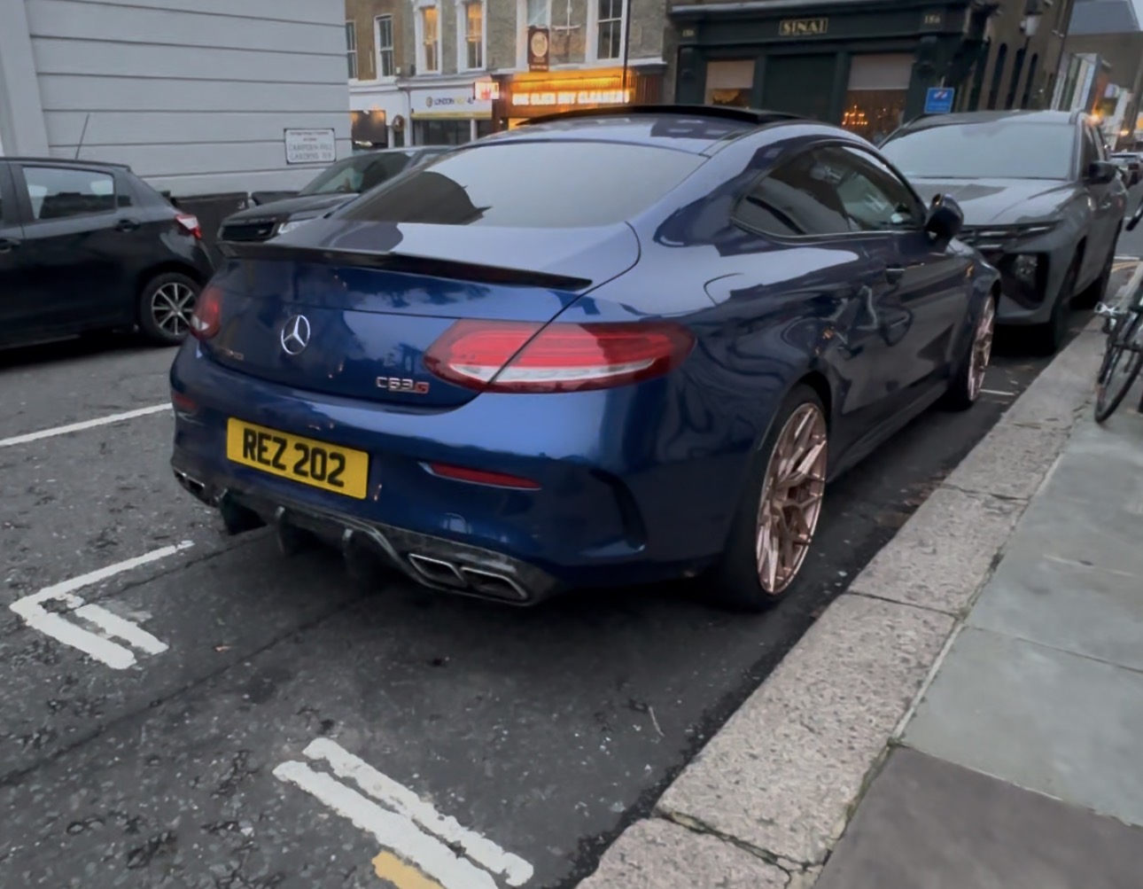 REZ 202 private number plate on a Mercedes-Benz C-Class, spotted in London
