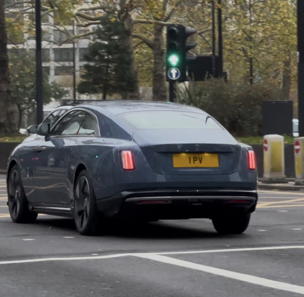 1 PV private number plate on a Rolls-Royce Spectre, spotted in London