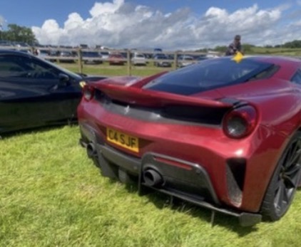 C4 SJF private number plate on a Ferrrari