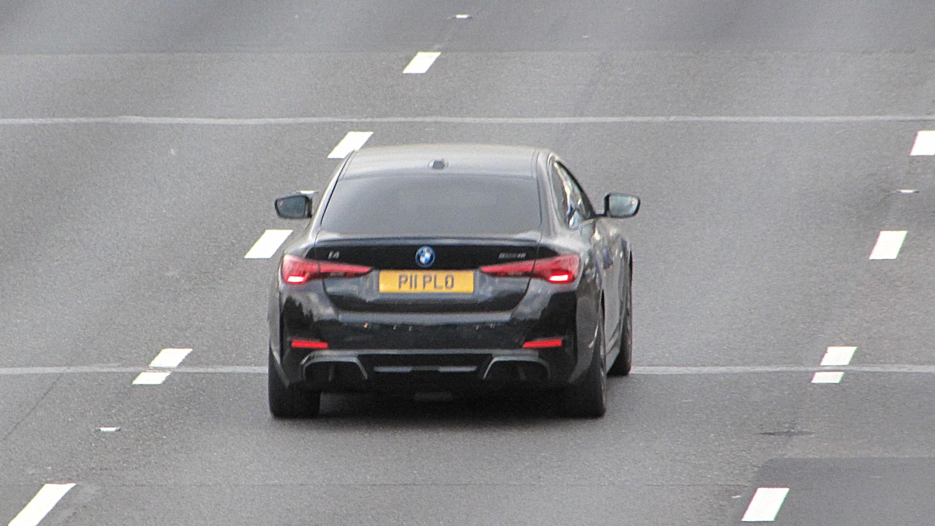 P11 PLO private number plate on a BMW i4, spotted in Slough