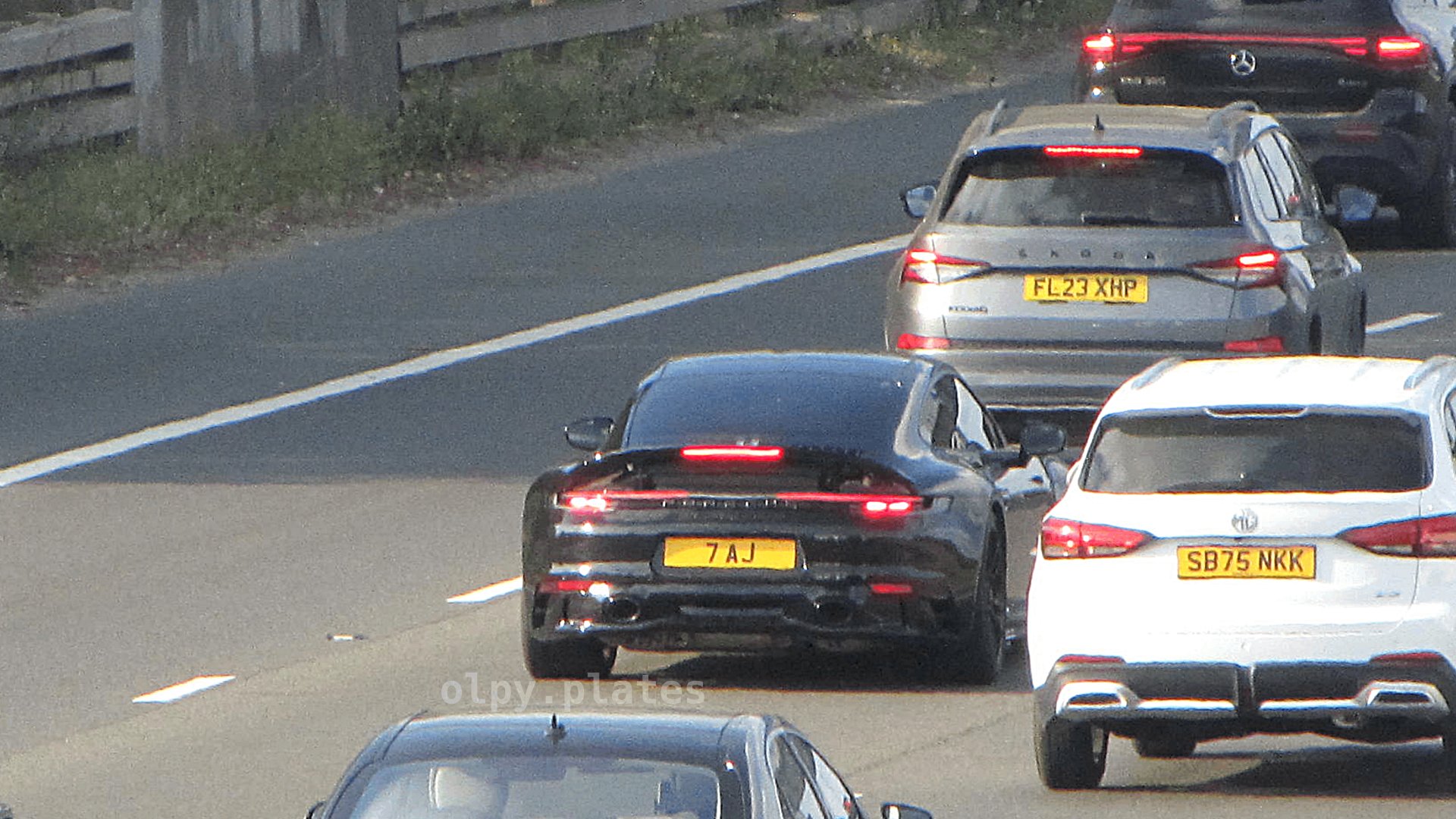 7 AJ spotted on Porsche 911