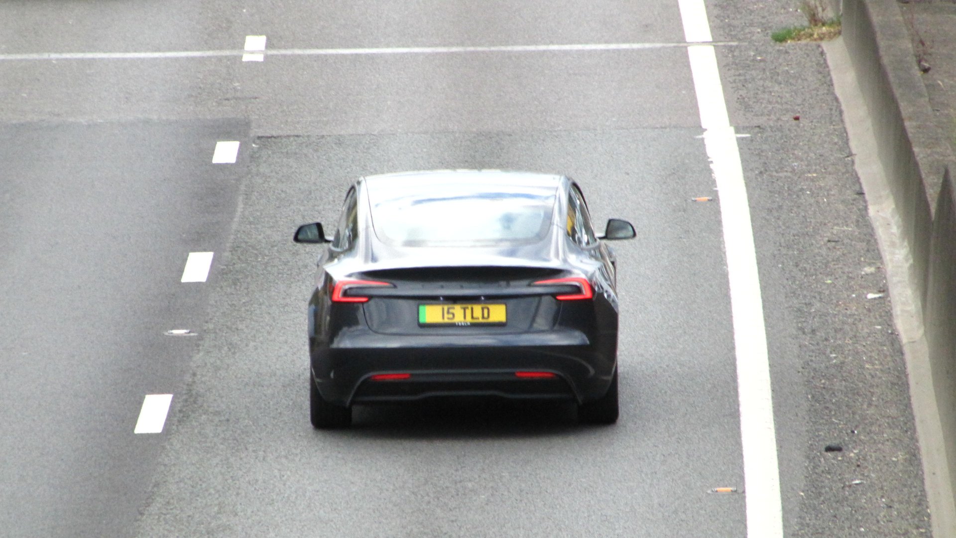 15 TLD spotted on Tesla Model 3