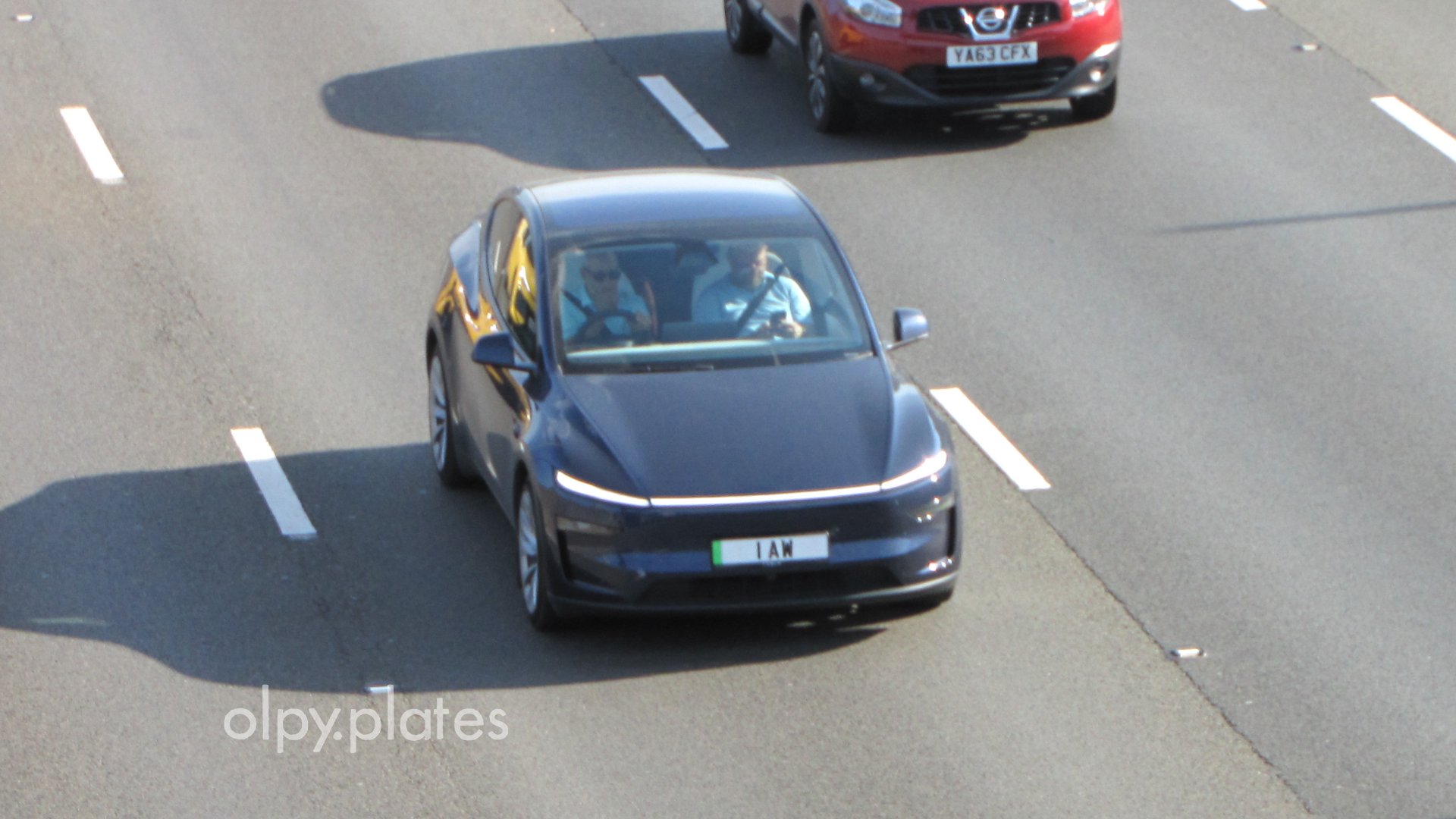 1 AW private number plate on a Tesla Model Y, spotted in Slough