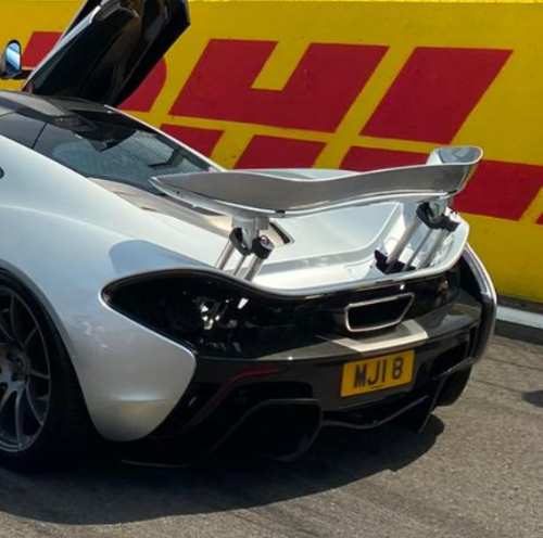 MJI 8 private number plate on a McLaren P1