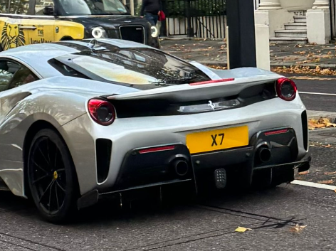 X 7 private number plate on a Ferrari 488