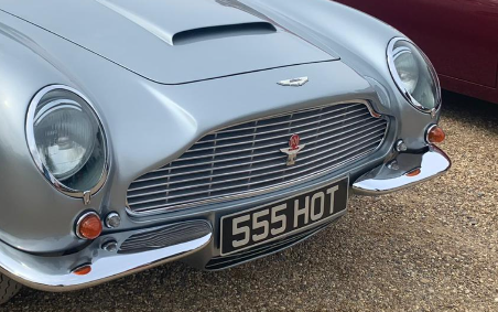555 HOT private number plate on a Aston Martin