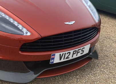 V12 PFS private number plate on a Aston Martin