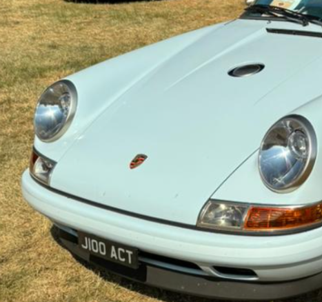J100 ACT private number plate on a Singer Classic Study
