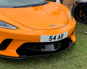 54 AB private number plate on a McLaren
