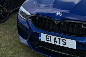 E1 ATS private number plate on a BMW M5, spotted in Goodwood