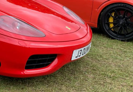 J30 UNN private number plate on a Ferrari