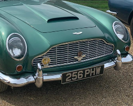 256 PHW private number plate on a Aston Martin