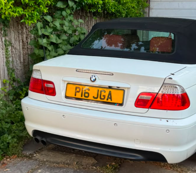 P16 JGA private number plate on a BMW, spotted in Wimbledon