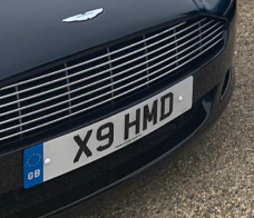 X9 HMD private number plate on a Aston Martin