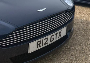 R12 GTX private number plate on a Aston Martin