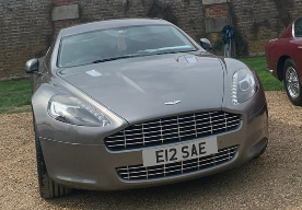 E12 SAE private number plate on a Aston Martin