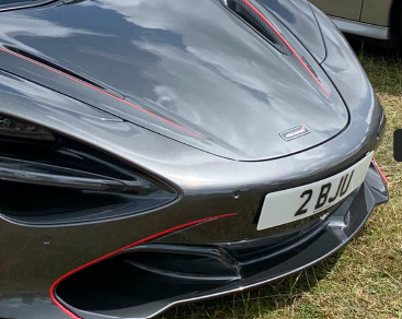 2 BJU private number plate on a McLaren