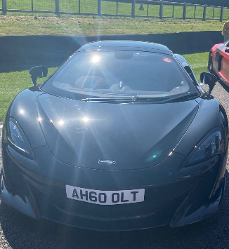 AH60 OLT private number plate on a McLaren 600LT, spotted in Goodwood Motor Circuit