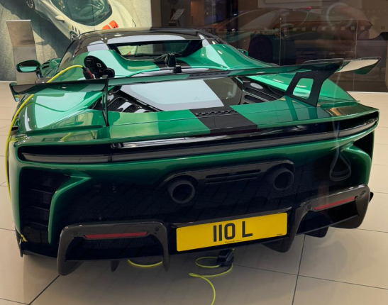 110 L private number plate on a Ferrari SF90
