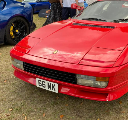66 MK private number plate on a Ferrari 512 TR